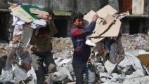 أطفال سوريون نازحون ومكبات نفايات في إدلب - 14 مارس 2024 (عارف وتد/ فرانس برس)