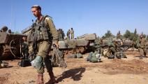 جنود إسرائيليون يتمركزون على حدود قطاع غزة، 24 نوفمبر 2023 (فرانس برس)