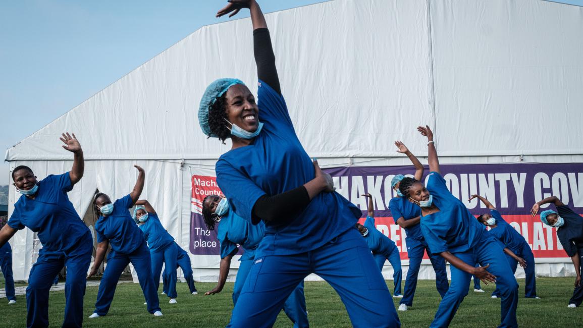 TOPSHOT-KENYA-HEALTH-VIRUS-DANCE TOPSHOT - Health care providers - nurses, doctors, midwives and health care workers- attend the 4th Zumba dance session organised by the Nursing Council of Kenya at Kenyatta stadium where screening booths and isolation field hospital are installed for the COVID-19 coronavirus in Machakos, Kenya, on June 19, 2020. - The Nursing Council of Kenya organizes dance sessions for health care providers to re-energize and uplift their sprits during this pandemic as a part of the celeb