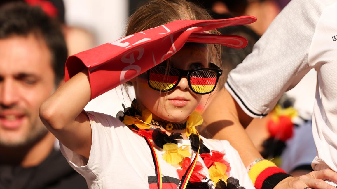 مشجعة ألمانية شابة خلال مباراة ألمانيا واليابان (ماثيو أشتون/Getty)
