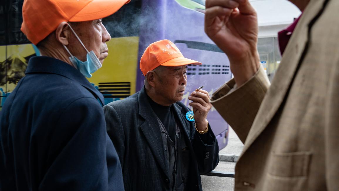 استراحة للتدخين في الصين (أنتوني كوان/ Getty)