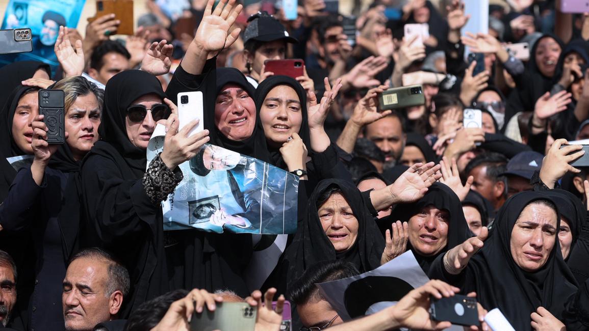 خلال جنازة الرئيس الإيراني وجمع من المسؤولين (Getty)