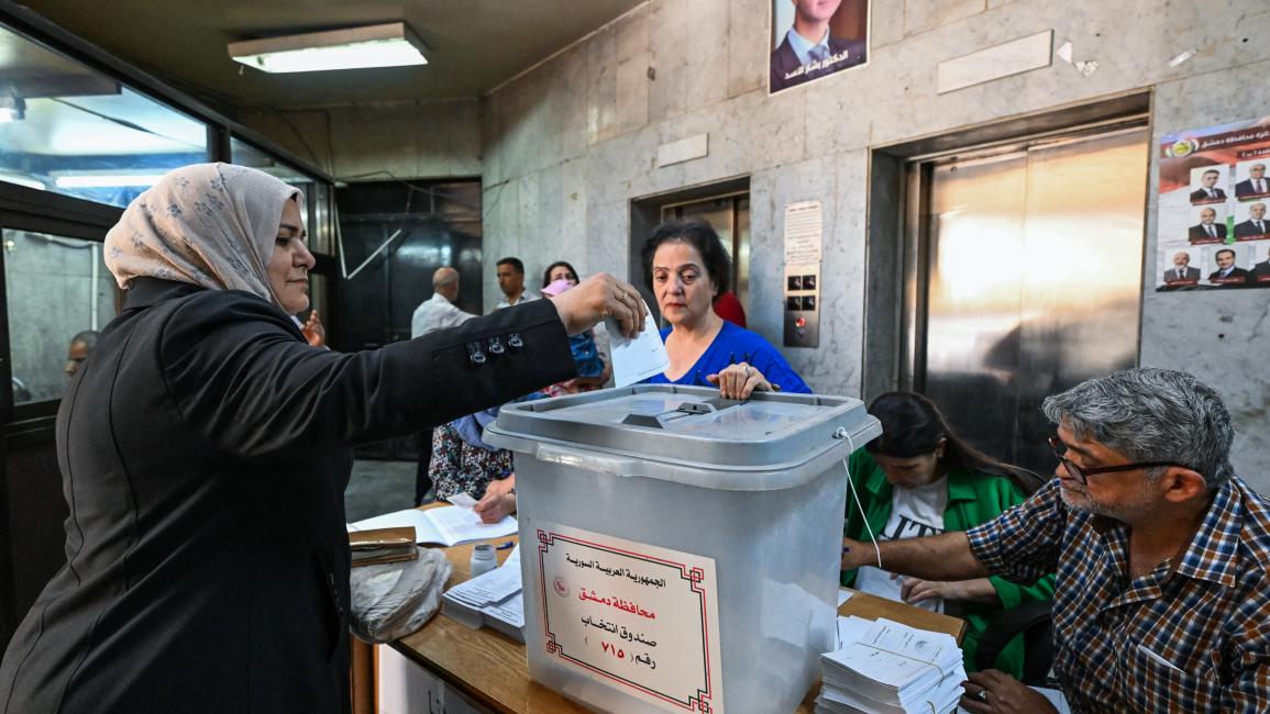 سوريون ينتخبون أعضاء جدد في مجلس الشعب في دمشق (15/7/2024 فرانس برس) 