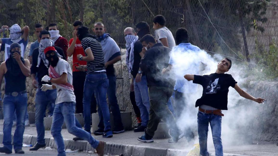فلسطينيون خلال مواجهات مع جيش الاحتلال الإسرائيلي في الضفة