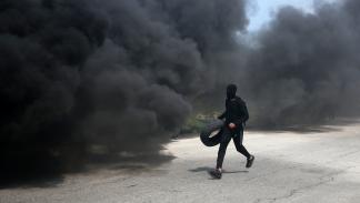 من اشتباك بين طلاب جامعة بيرزيت وقوات الاحتلال، مارس 2019 (عباس مومني/ فرانس برس)