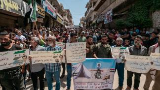 احتجاجات ضد "هيئة تحرير الشام" بإدلب، مايو 2024 (معاوية أطرش/فرانس برس)