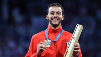 محمد السيد الحائز على الميدالية البرونزية في باريس، 28 يوليو 2024 (فرانك فيف/ فرانس برس)