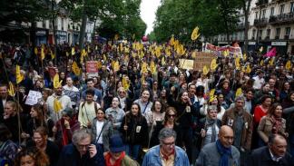 خلال تظاهرة في فرنسا ضد حزب التجمع الوطني، 15-6- 2024 (رويترز)