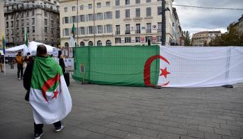 متظاهر في الجزائر، 14 نوفمبر 2021 (جيرار بوتينو/ Getty)