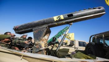 عناصر من كتائب "حزب الله" العراقية (فرانس برس)