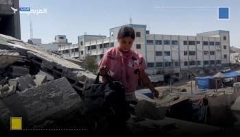 فلسطينيون يبحثون بين الأنقاض بعد غارة إسرائيلية على خانيونس