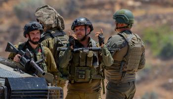 جنود إسرائيليون يتجمعون بالقرب من بلدة بيتا 2 يوليو 2024 (Getty)