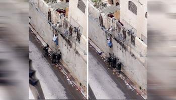تسلق جدار الفصل العنصري القدس (شيرين ظافر صندوقة)