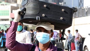 عمال في الكويت فيروس كورونا YASSER AL-ZAYYAT/AFP