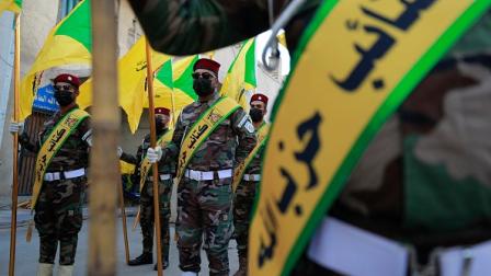 عناصر من حزب الله في جنازة أحد المقاتلين، 21 نوفمبر 2023 (فرانس برس)