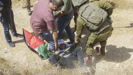 اعتقال فلسطينيي في نابلس (ناصر أشتيه/ Getty)