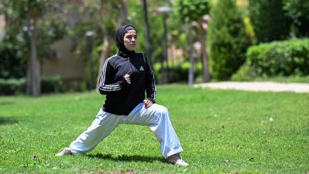 ميس البسطامي لاعبة كاراتيه فلسطينية من غزة في مصر - 25 يونيو 2024 (خالد دسوقي/ فرانس برس)