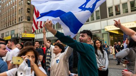 تظاهرة أمام "وول ستريت" بنيويورك مناصرة لغزة، 15 أبريل2024، ( سبنسر بلات/Getty)
