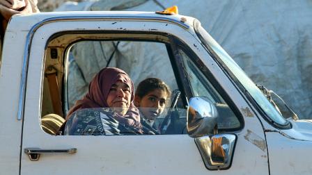 لاجئون سوريون في أثناء مغادرتهم لبنان، البقاع 14 مايو 2024 (Getty)