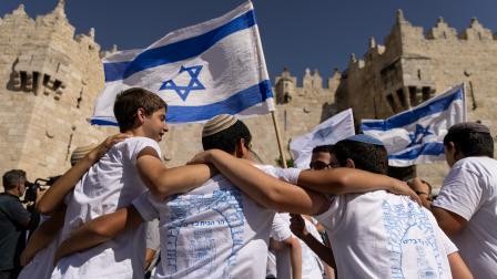 مستوطنون في القدس خلال مسيرة الأعلام، 5 يونيو 2024 (فايز أبو رميلة/فرانس برس)
