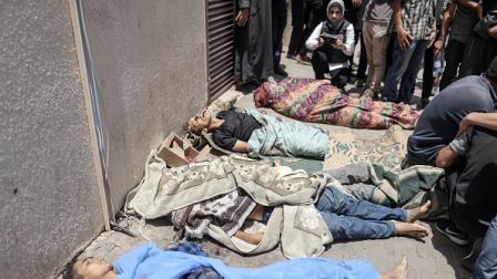 جثث لفلسطينيين استشهدوا في مجرزة النصيرات